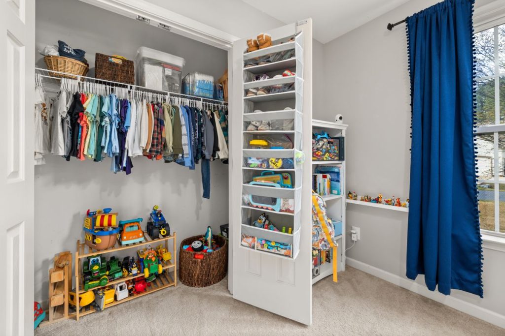 Organized childrens closet with storage solutions for Eastern Europe home organization and space-saving vacuum bags