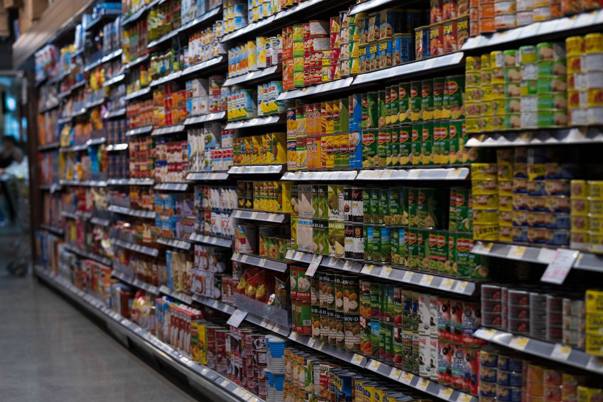 Well-organized grocery store shelves showing retail diversity
