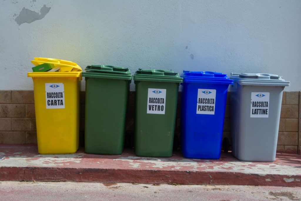 Colorful recycling bins for waste segregation and EU compliance