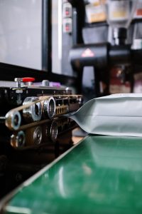Industrial sealing machine used in vacuum bag valve manufacturing and quality testing