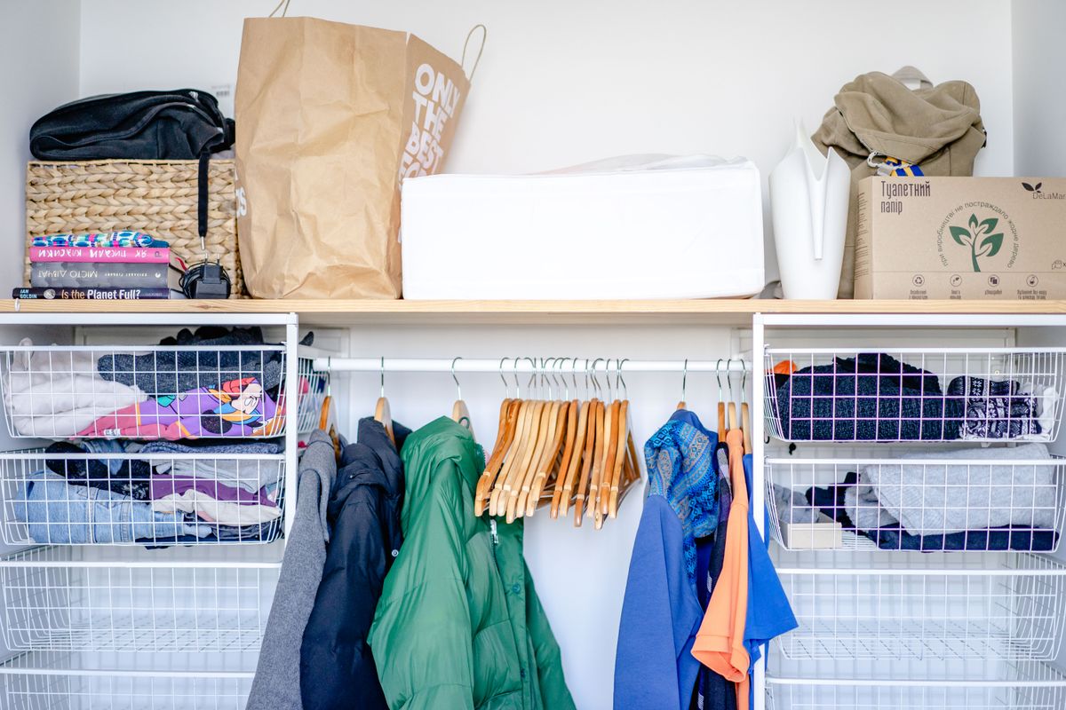 Italian wardrobe organization with vacuum storage bags