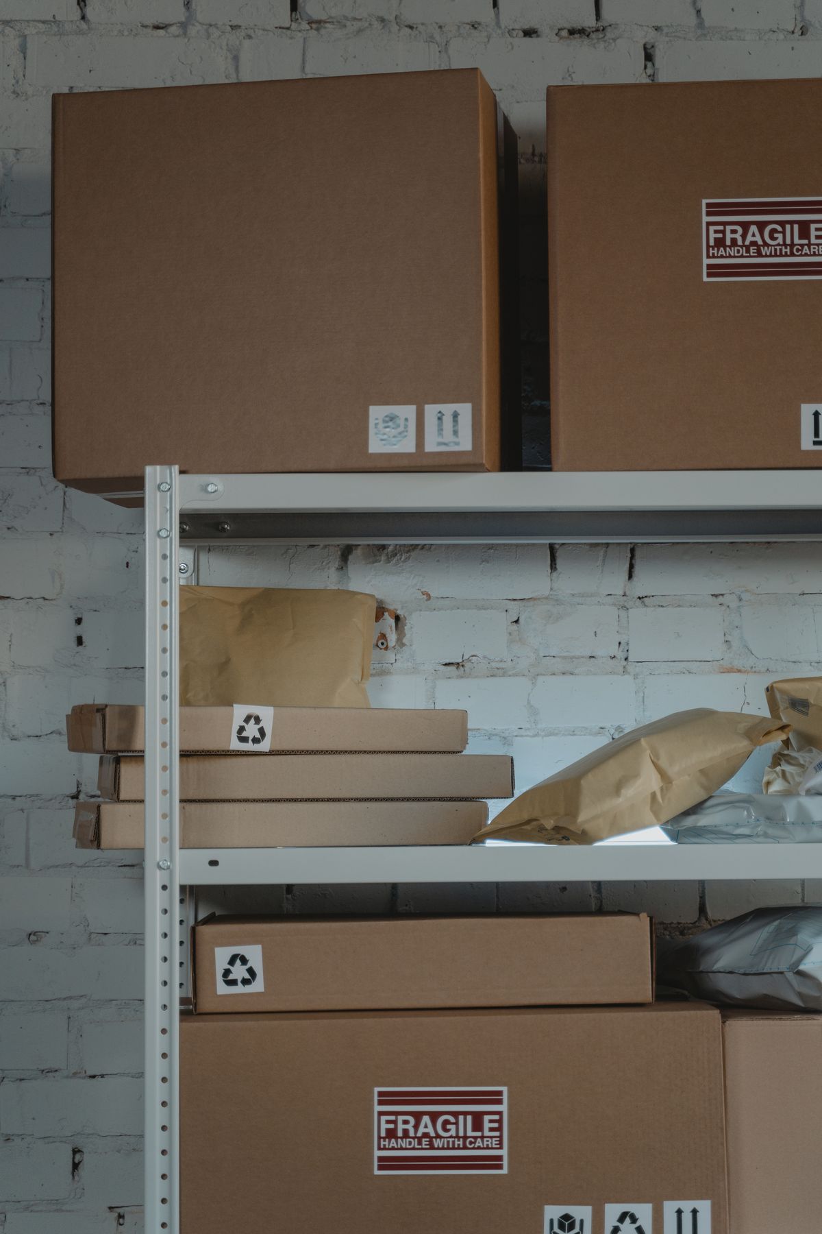Cardboard boxes on warehouse shelves ready for e-commerce fulfillment of vacuum storage bags